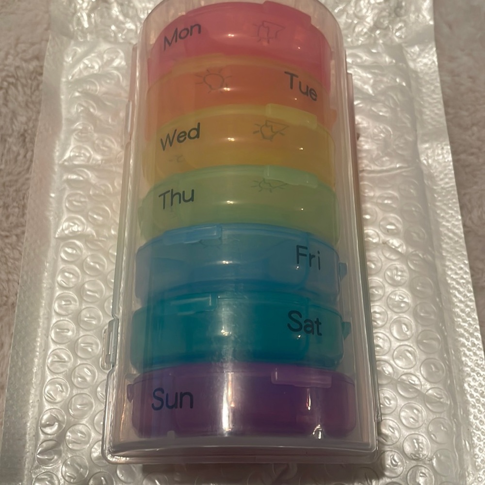 Pill containers by day,  7 days ,   morning, mid day and night compartments!